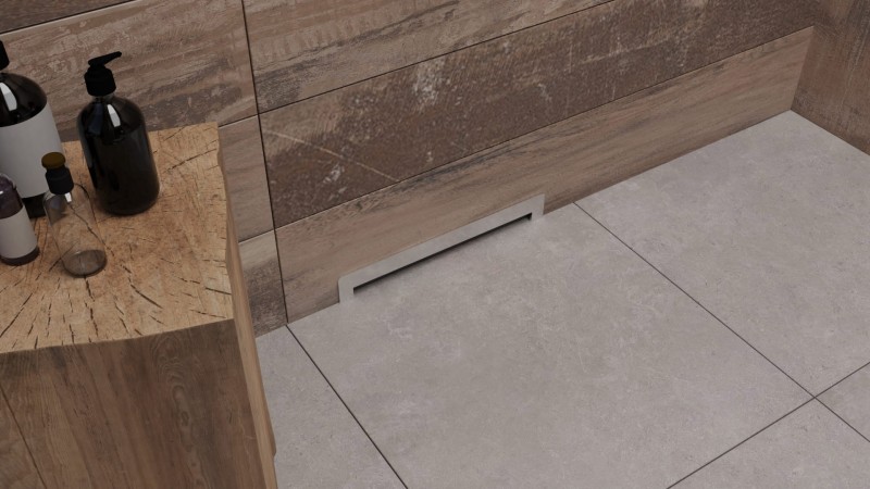 Odwodnienie łazienkowe ścienne stal szczotkowana w jasnej łazience