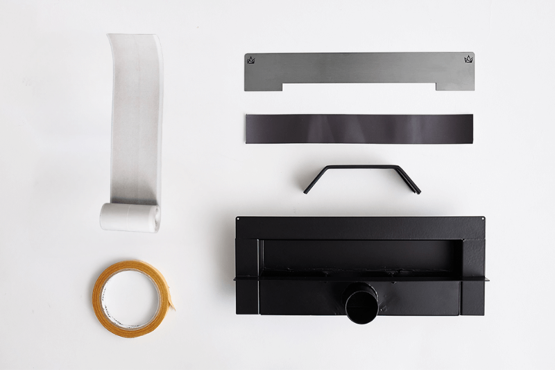 Rozłożone elemnty zestawu odpływu ściennego grafitowego